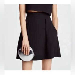 Black Halo black pleated skirt with pockets, size 0